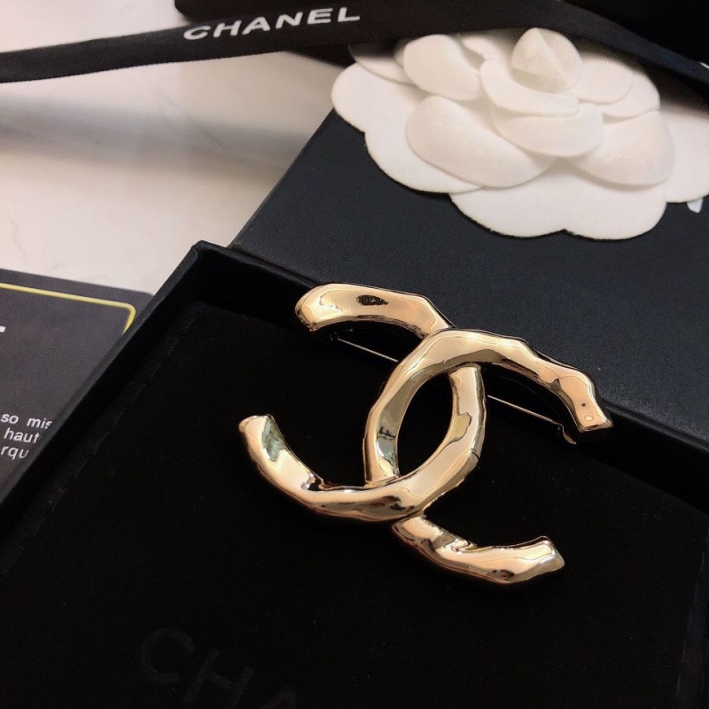 Ch*el brooches